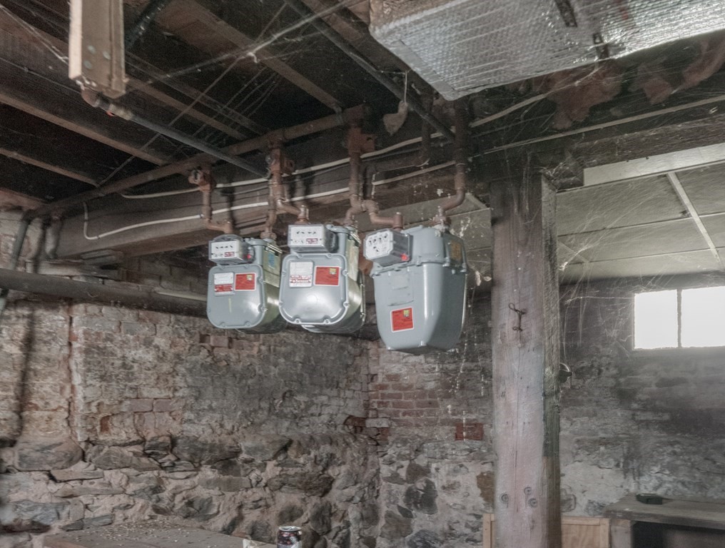 83 Canterbury Street Worcester, MA 01603 - Photo 29 of 42 a water heater room