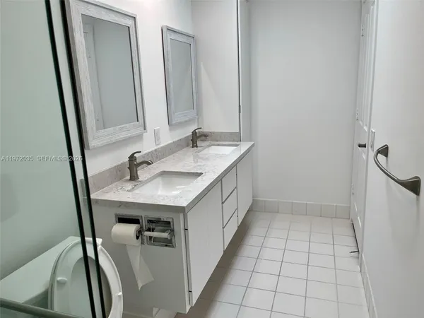 a bathroom with a sink and a toilet