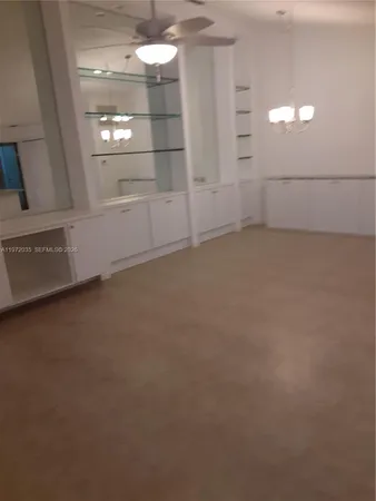 a view of a room with an empty space