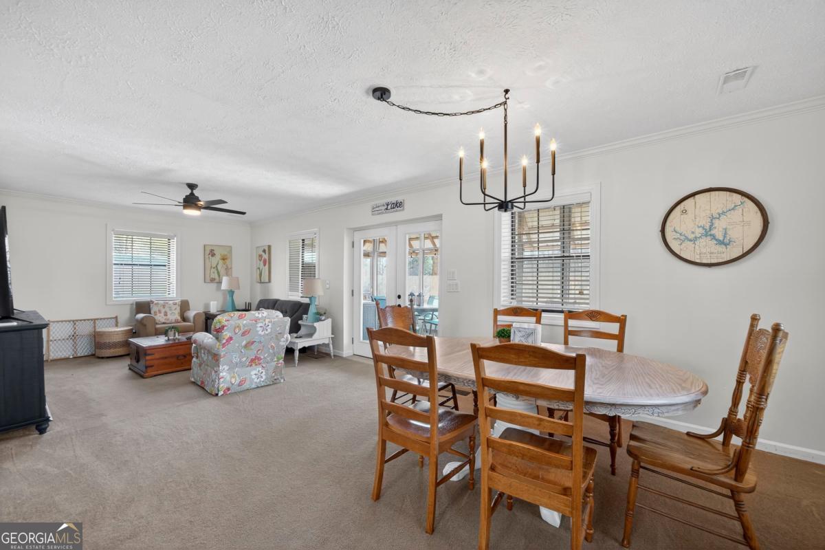 219 Hickory Pass Sparta, GA 31087 - Photo 11 of 62 a view of a dining room with furniture