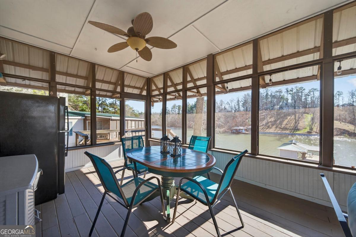 219 Hickory Pass Sparta, GA 31087 - Photo 21 of 62 a view of a dining room with furniture window and outside view