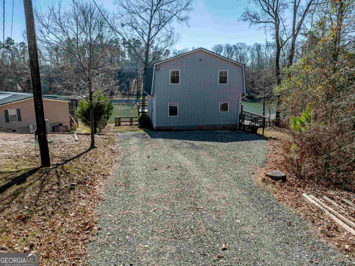 219 Hickory Pass Sparta, GA 31087 - Photo 41 of 62 a view of a house with backyard