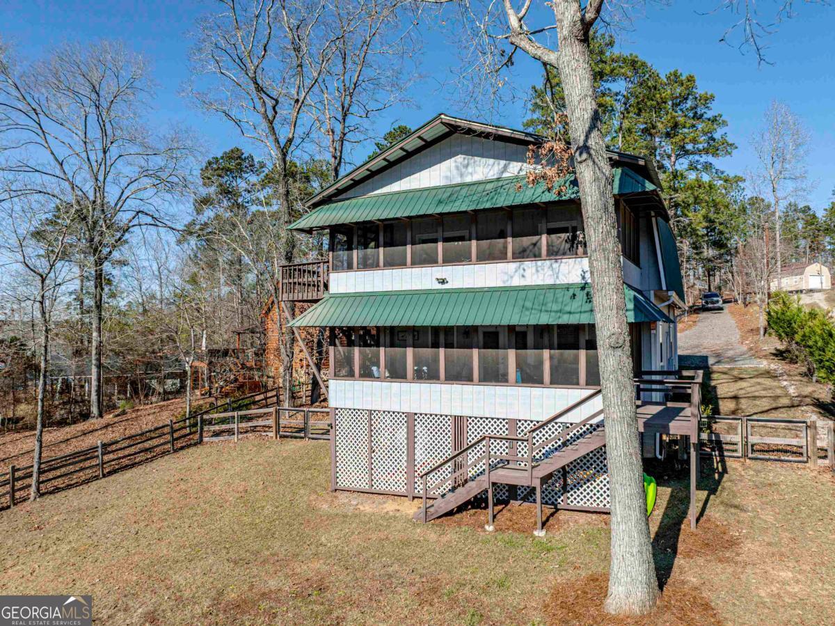 219 Hickory Pass Sparta, GA 31087 - Photo 47 of 62 front view of a house with a porch