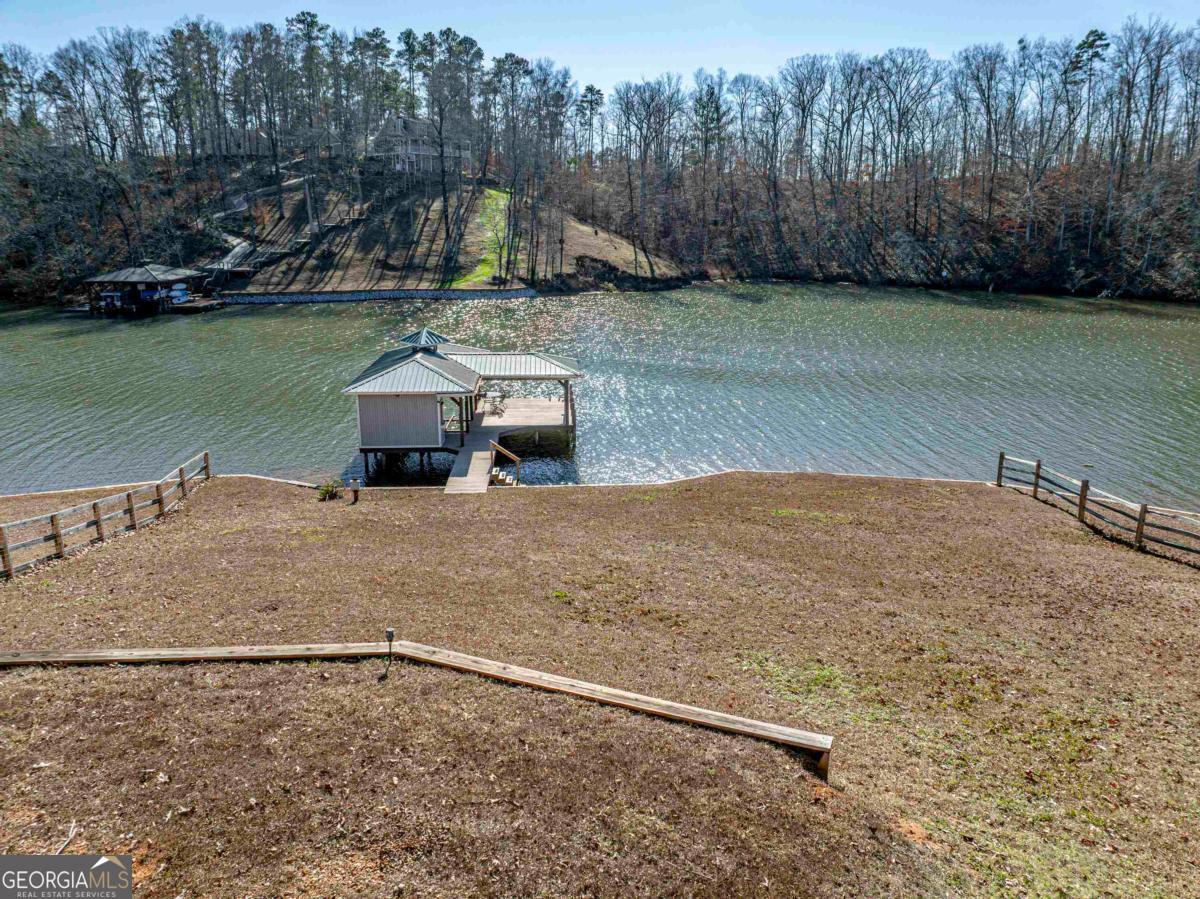 219 Hickory Pass Sparta, GA 31087 - Photo 49 of 62 a view of a house with a yard