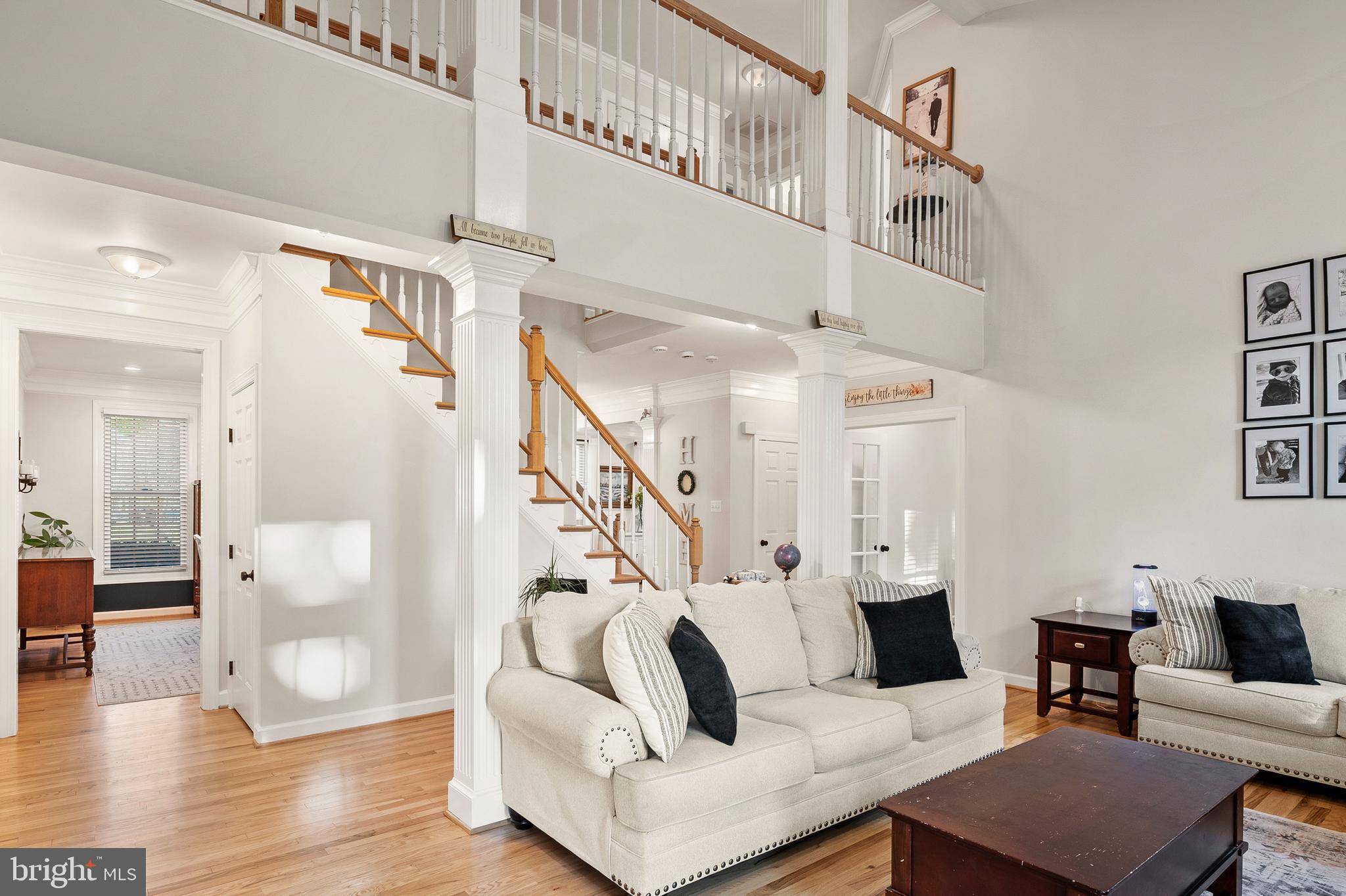 9916 Founders Way Damascus, MD 20872 - Photo 13 of 53 a living room with furniture and wooden floor
