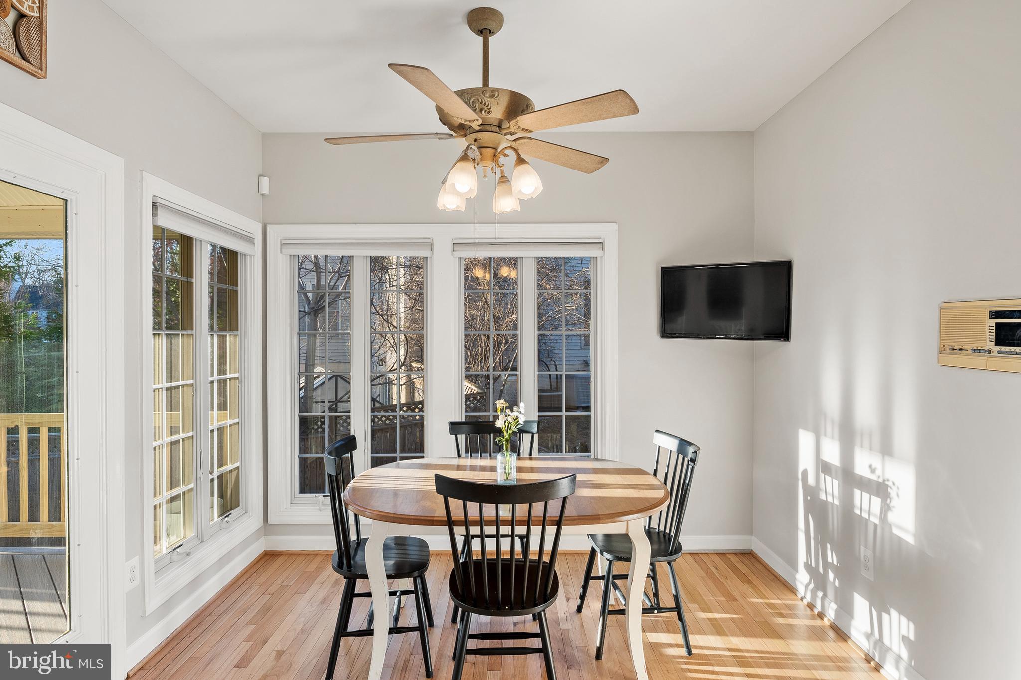 9916 Founders Way Damascus, MD 20872 - Photo 19 of 53 a view of a dining room with furniture window and wooden floor