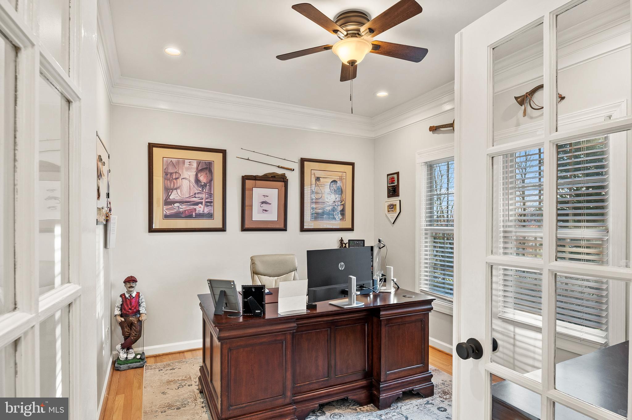 9916 Founders Way Damascus, MD 20872 - Photo 22 of 53 a view of a workspace with furniture and a window