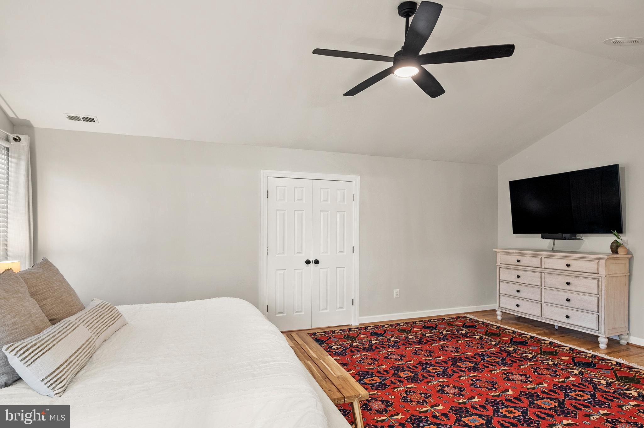 9916 Founders Way Damascus, MD 20872 - Photo 28 of 53 a bedroom with a bed and flat screen tv