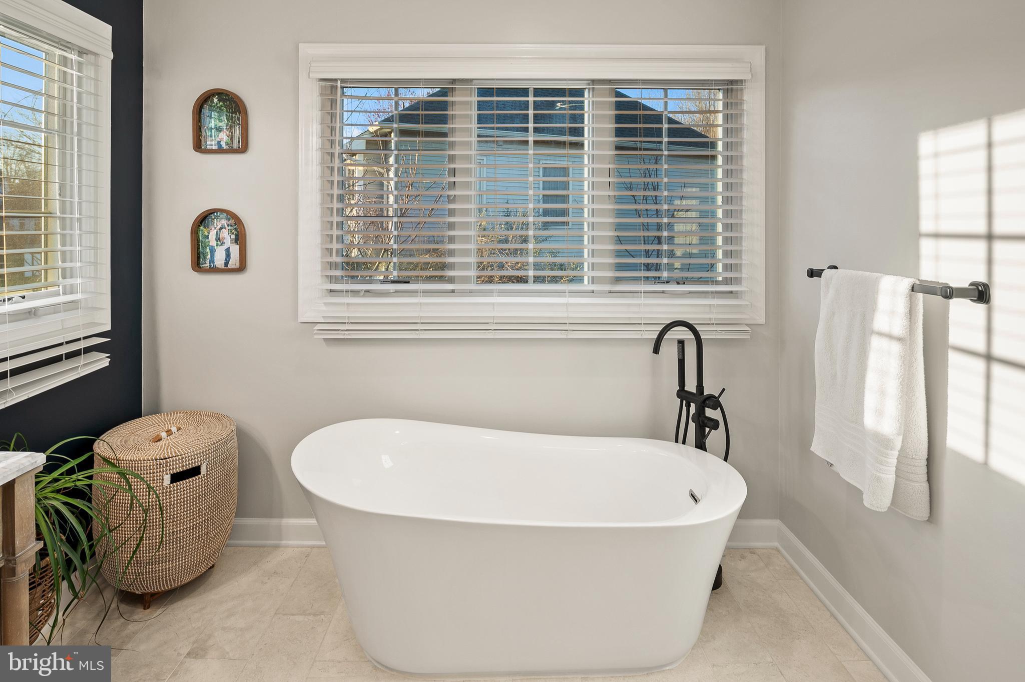 9916 Founders Way Damascus, MD 20872 - Photo 32 of 53 a white bath tub sitting next to a window