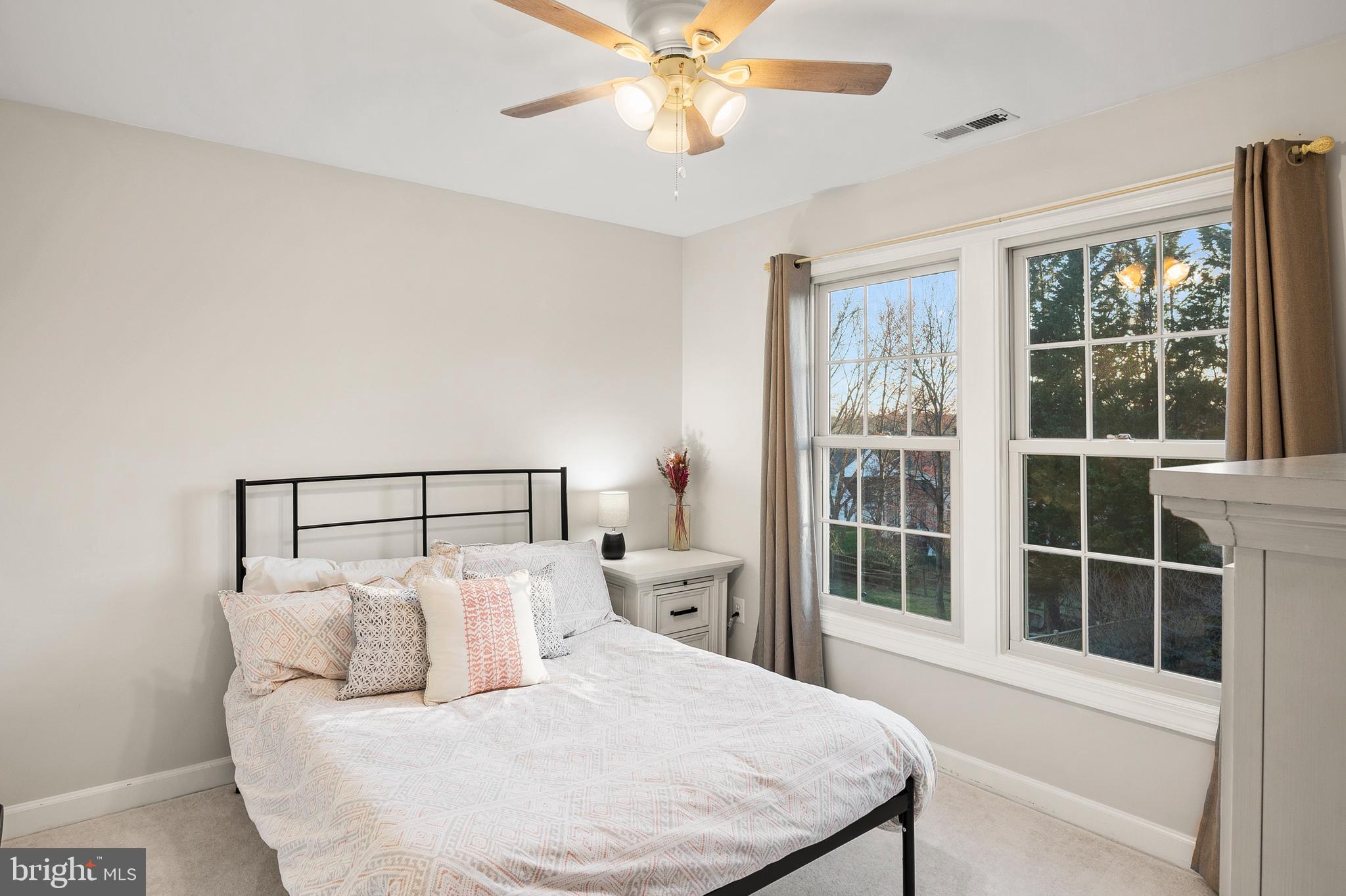9916 Founders Way Damascus, MD 20872 - Photo 40 of 53 a bed room with a bed and a large window