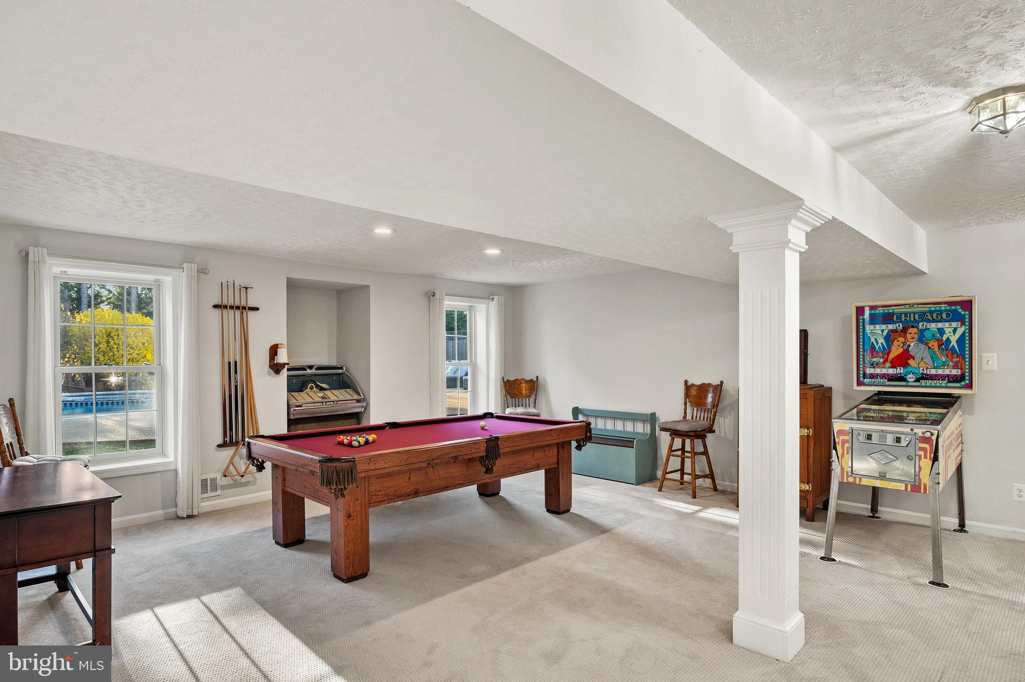 9916 Founders Way Damascus, MD 20872 - Photo 44 of 53 a living room with furniture a piano and a flat screen tv