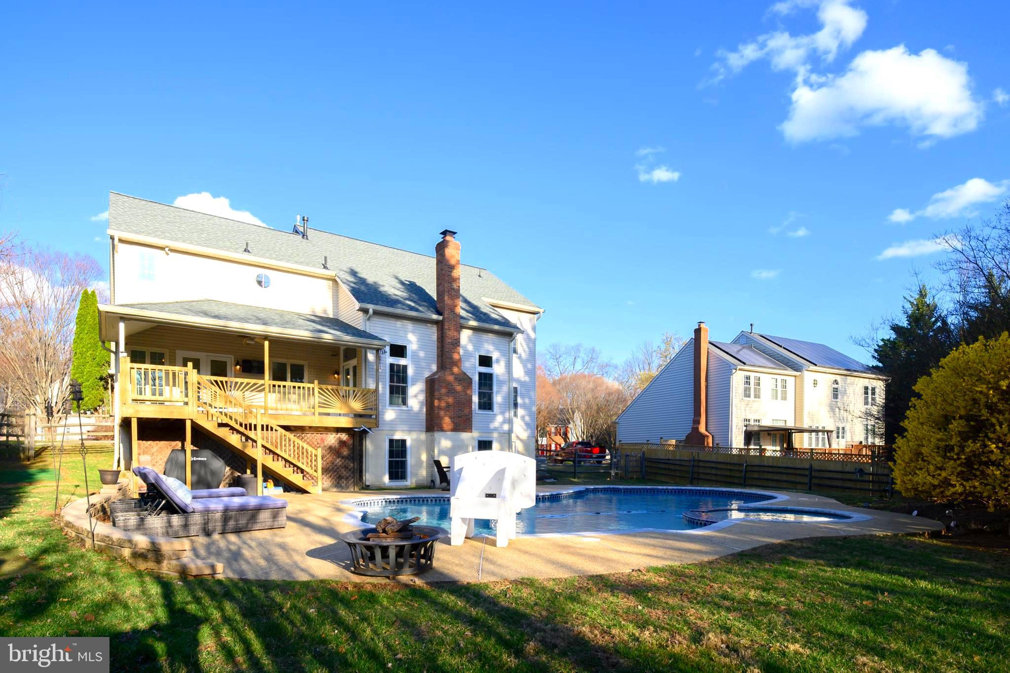 9916 Founders Way Damascus, MD 20872 - Photo 48 of 53 a view of a house with swimming pool and sitting area