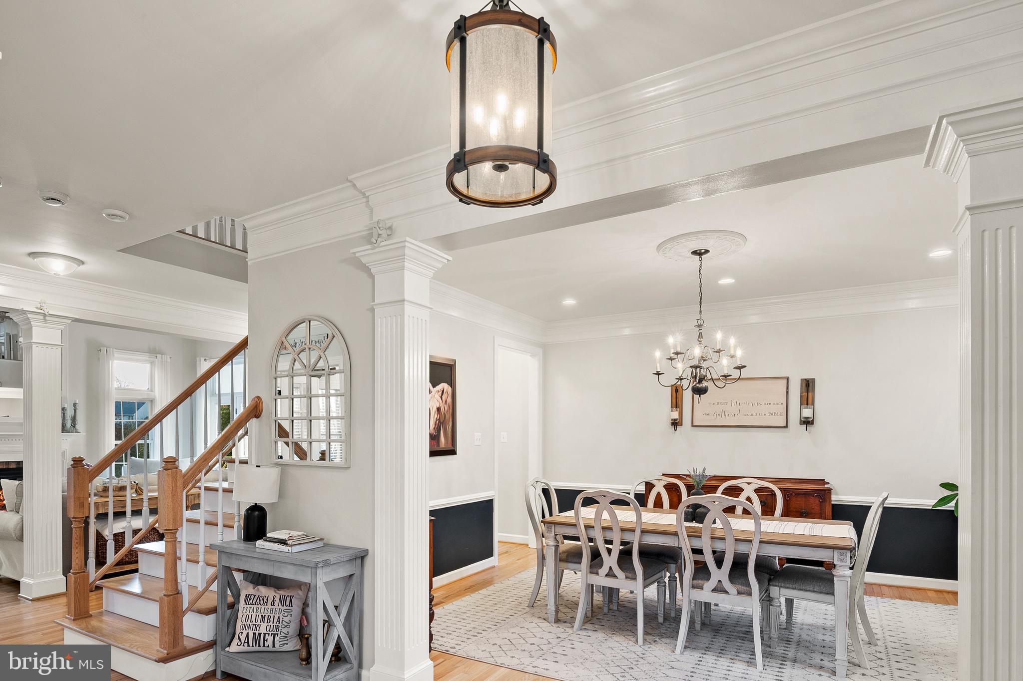 9916 Founders Way Damascus, MD 20872 - Photo 6 of 53 a view of a dining room with furniture and wooden floor