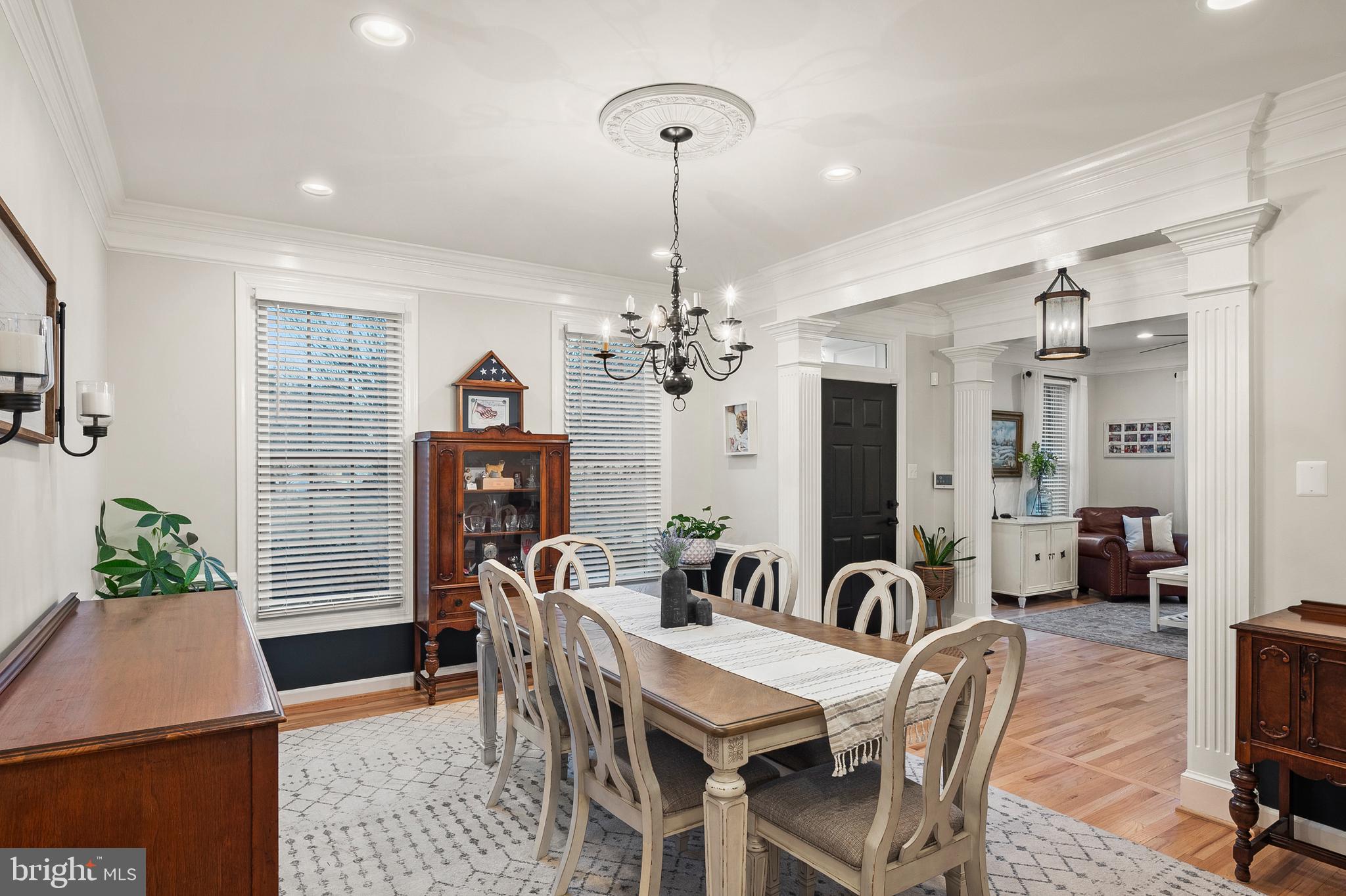 9916 Founders Way Damascus, MD 20872 - Photo 8 of 53 a view of a a dining room with furniture window and wooden floor