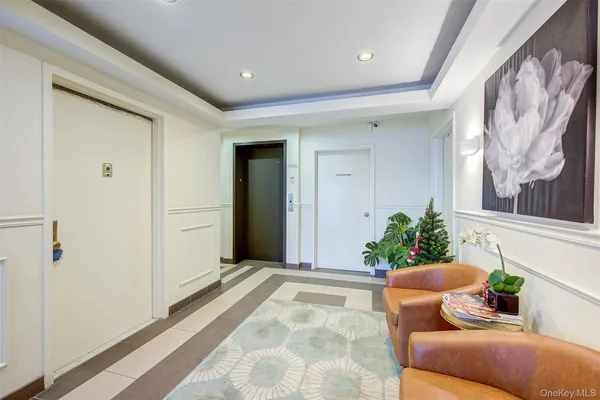 a view of entryway with flower pots