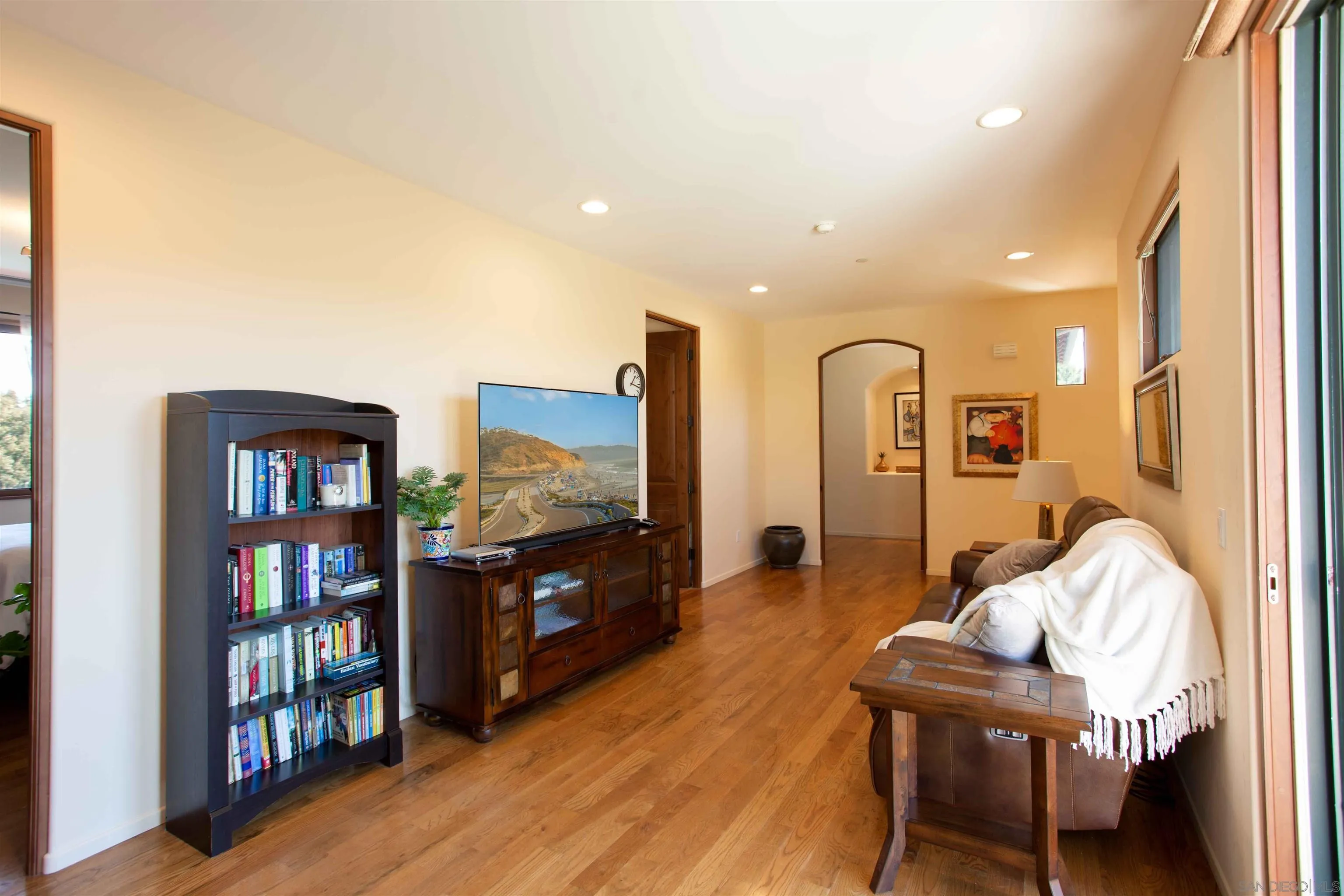 2624 Lone Jack Road Encinitas, CA 92024 - Photo 16 of 37 a living room with furniture and a flat screen tv