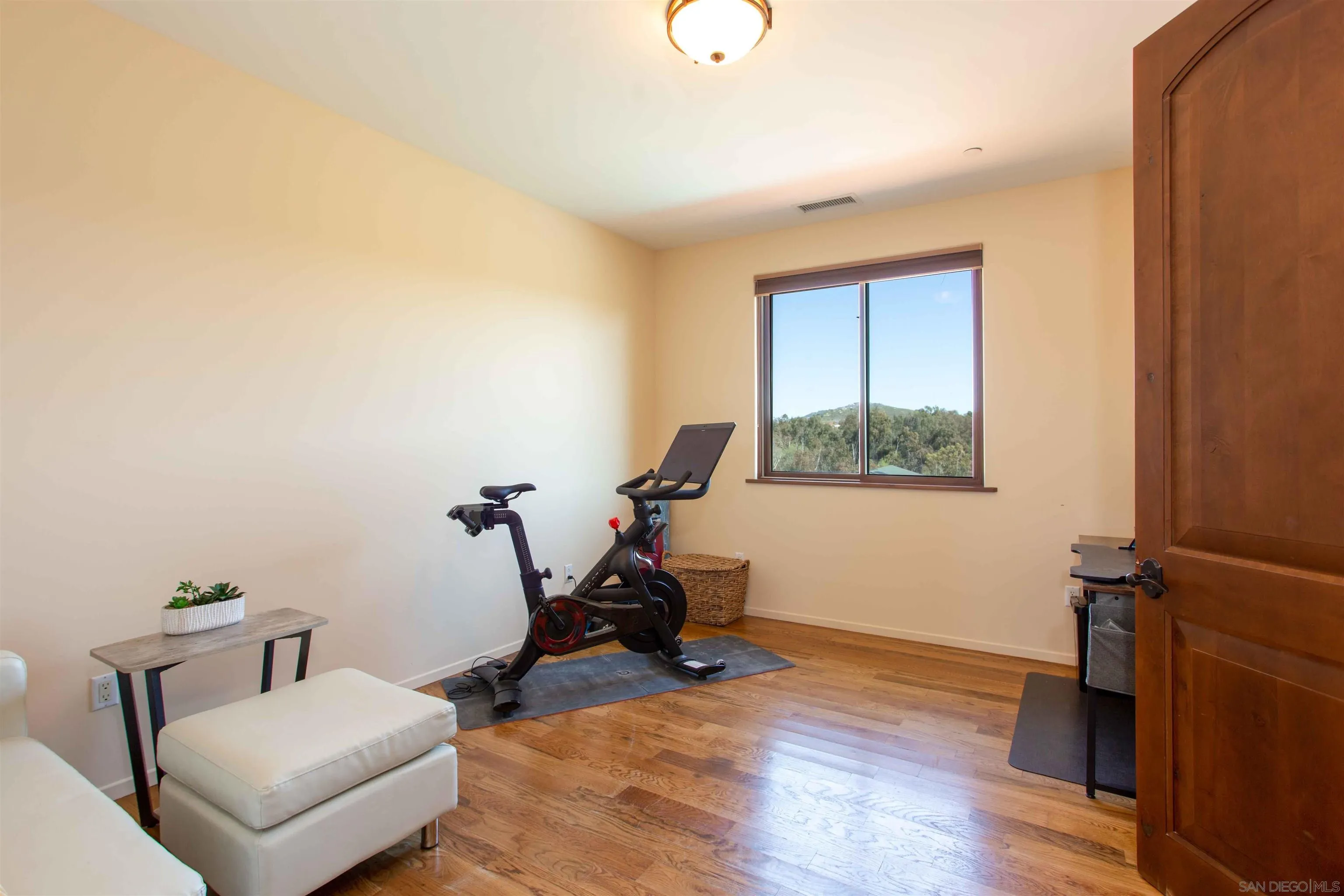 2624 Lone Jack Road Encinitas, CA 92024 - Photo 23 of 37 a living room with furniture a air conditioner vent and a window