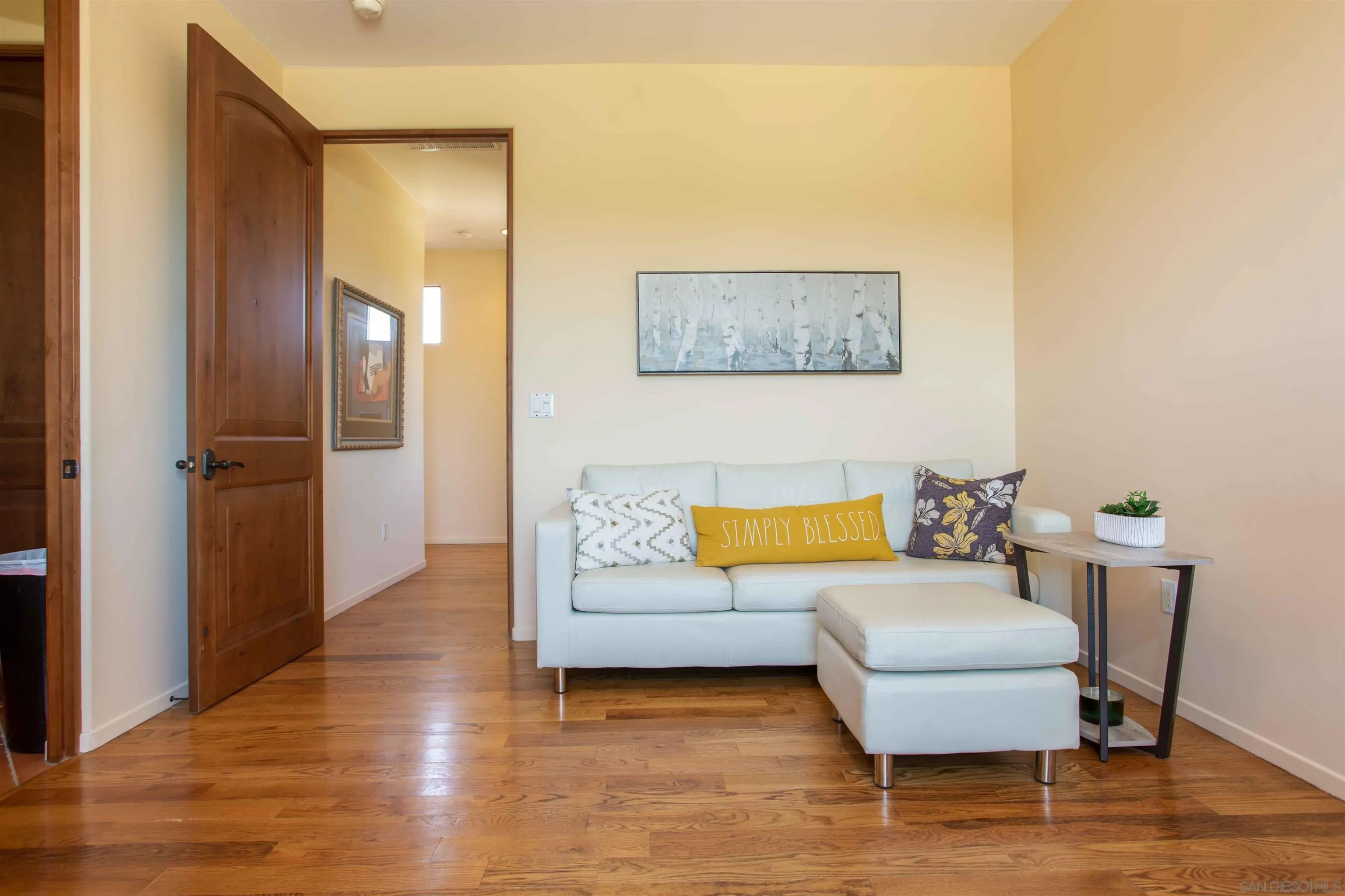 2624 Lone Jack Road Encinitas, CA 92024 - Photo 24 of 37 a living room with furniture and a wooden floor