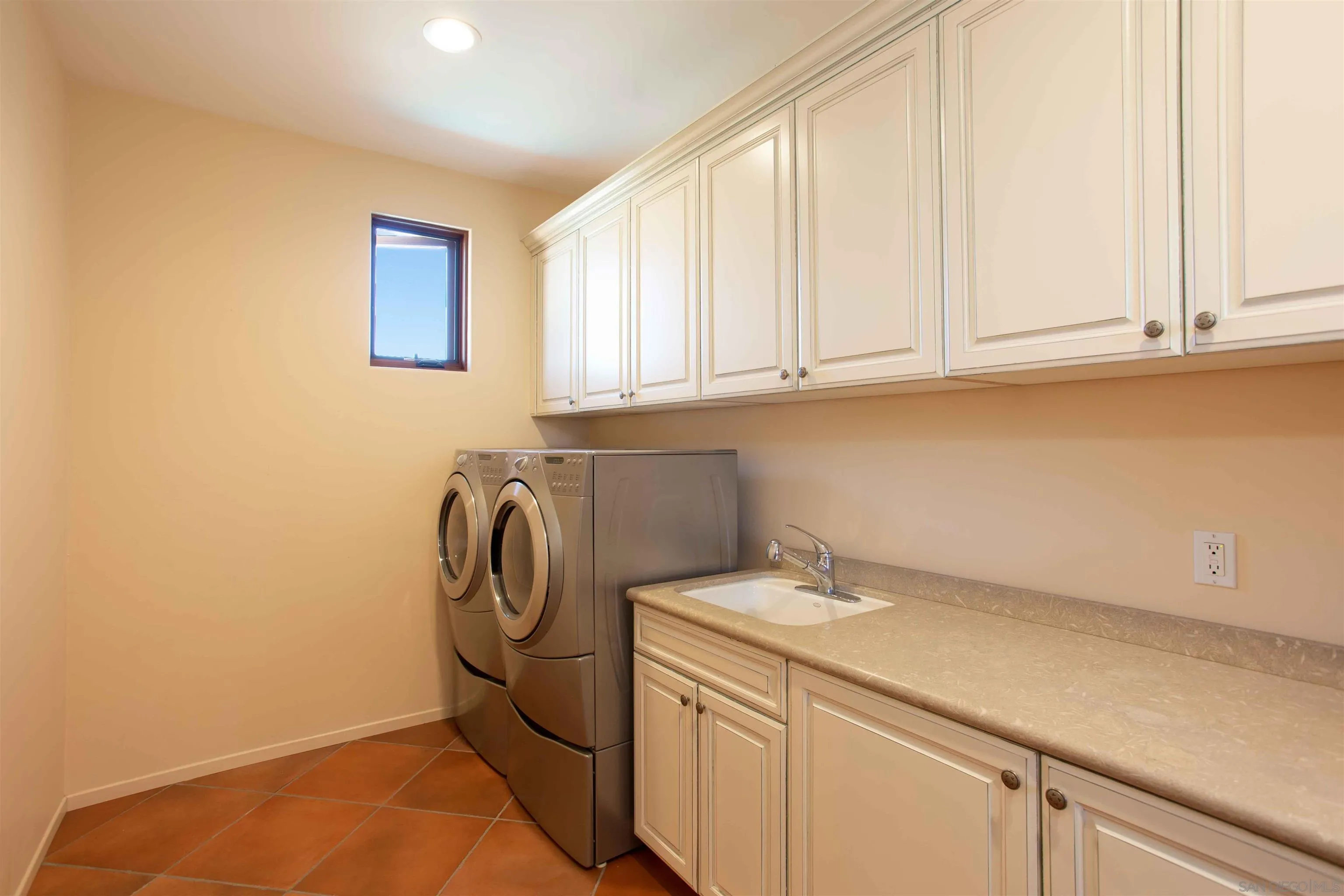 2624 Lone Jack Road Encinitas, CA 92024 - Photo 26 of 37 a utility room with dryer and washer