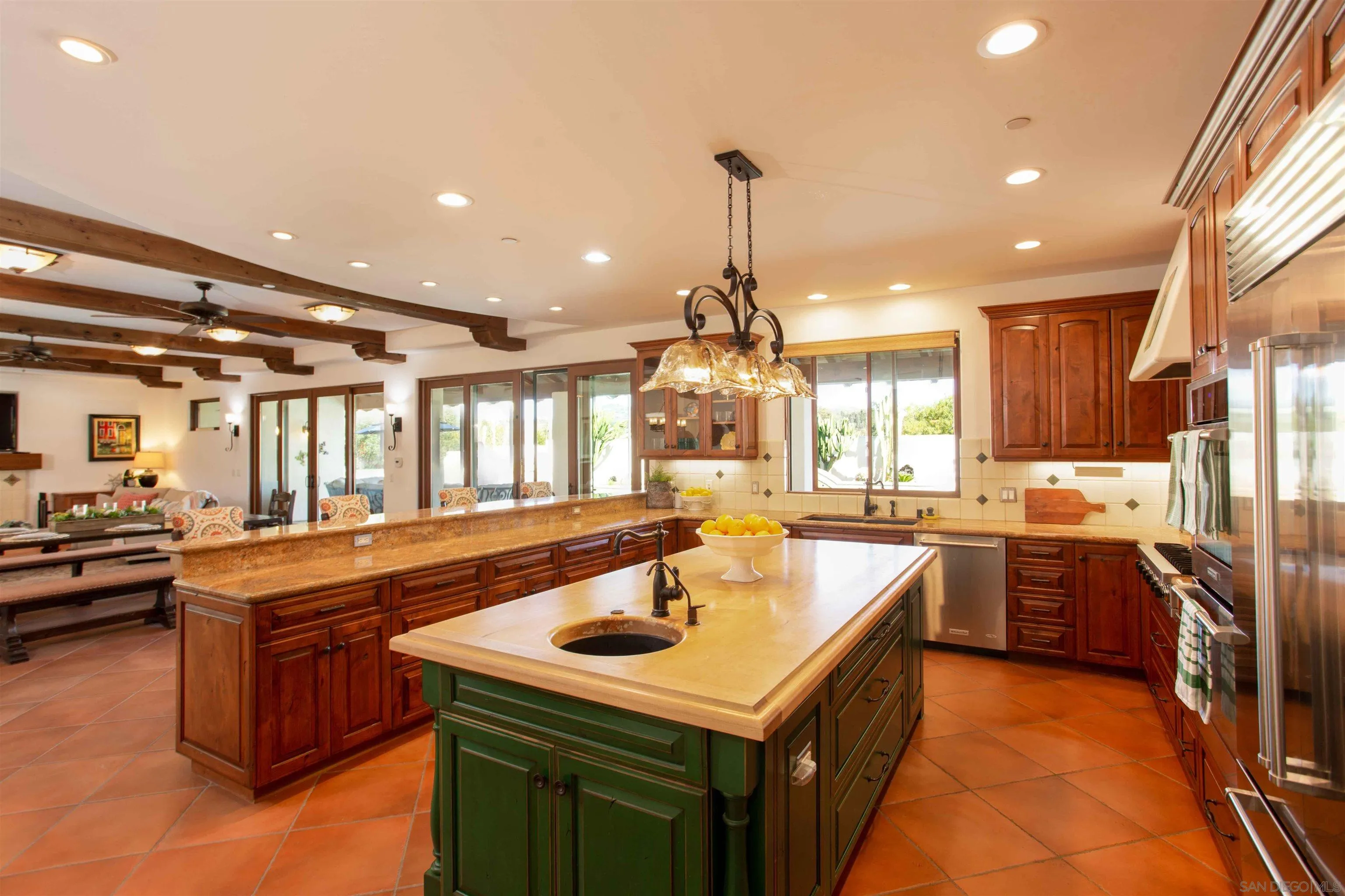 2624 Lone Jack Road Encinitas, CA 92024 - Photo 7 of 37 a kitchen with lots of counter top space and appliances