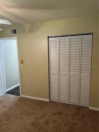 an empty room with closet