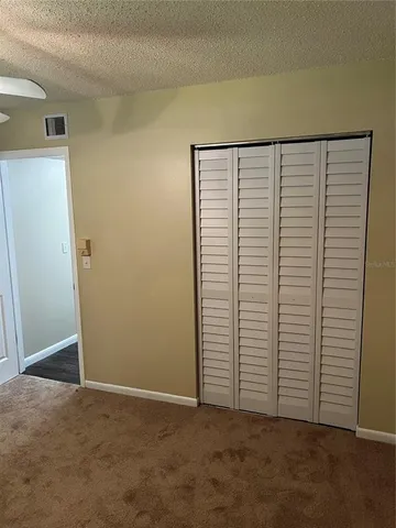 an empty room with closet