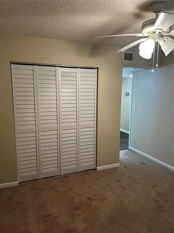 an empty room with a white door
