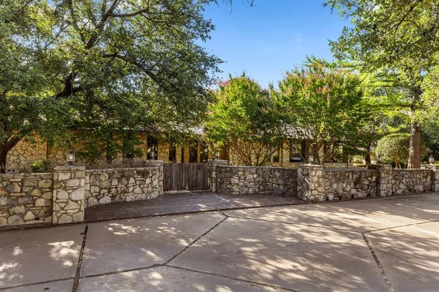 a view of a street with an outdoor space