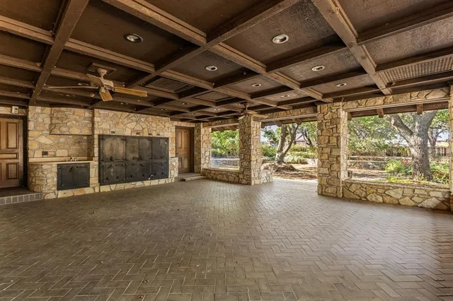 a view of an empty room with a sliding door