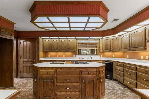 a view of a kitchen with a sink