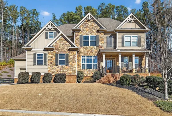 front view of a house with a yard