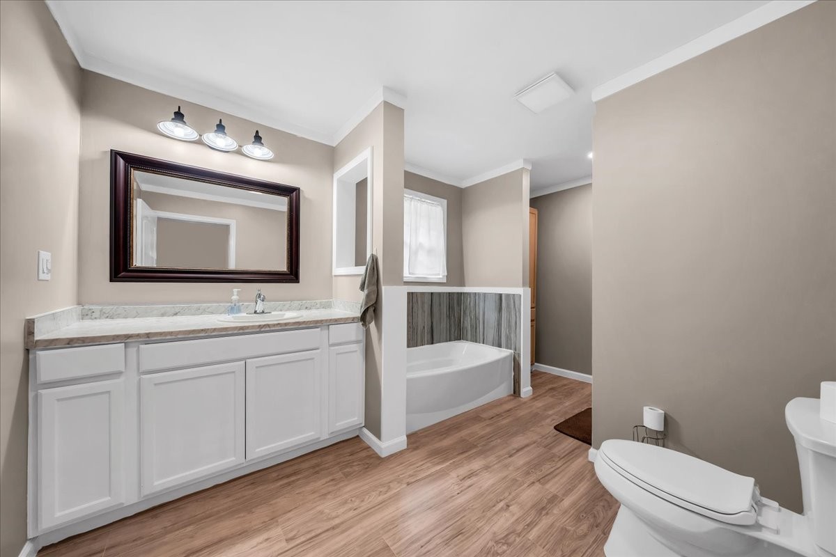 802 Meyers Road Altamont, TN 37301 - Photo 9 of 30 a bathroom with a toilet sink and mirror