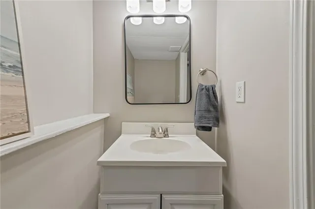 a bedroom with furniture and a flat screen tv