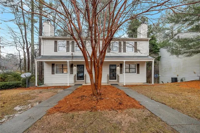 a balcony with wooden floor