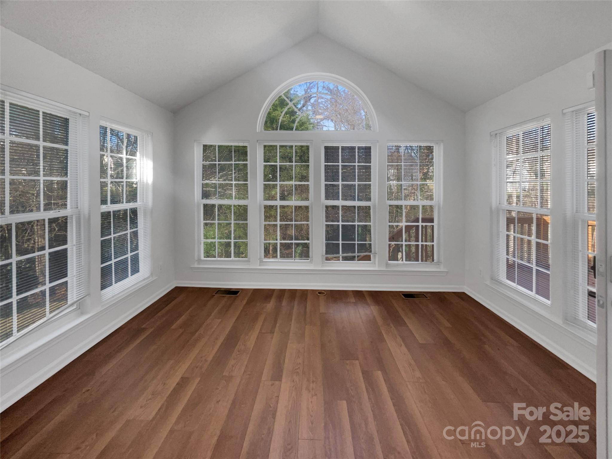 405 St George Road Fort Mill, SC 29708 - Photo 11 of 15 an empty room with wooden floor and windows