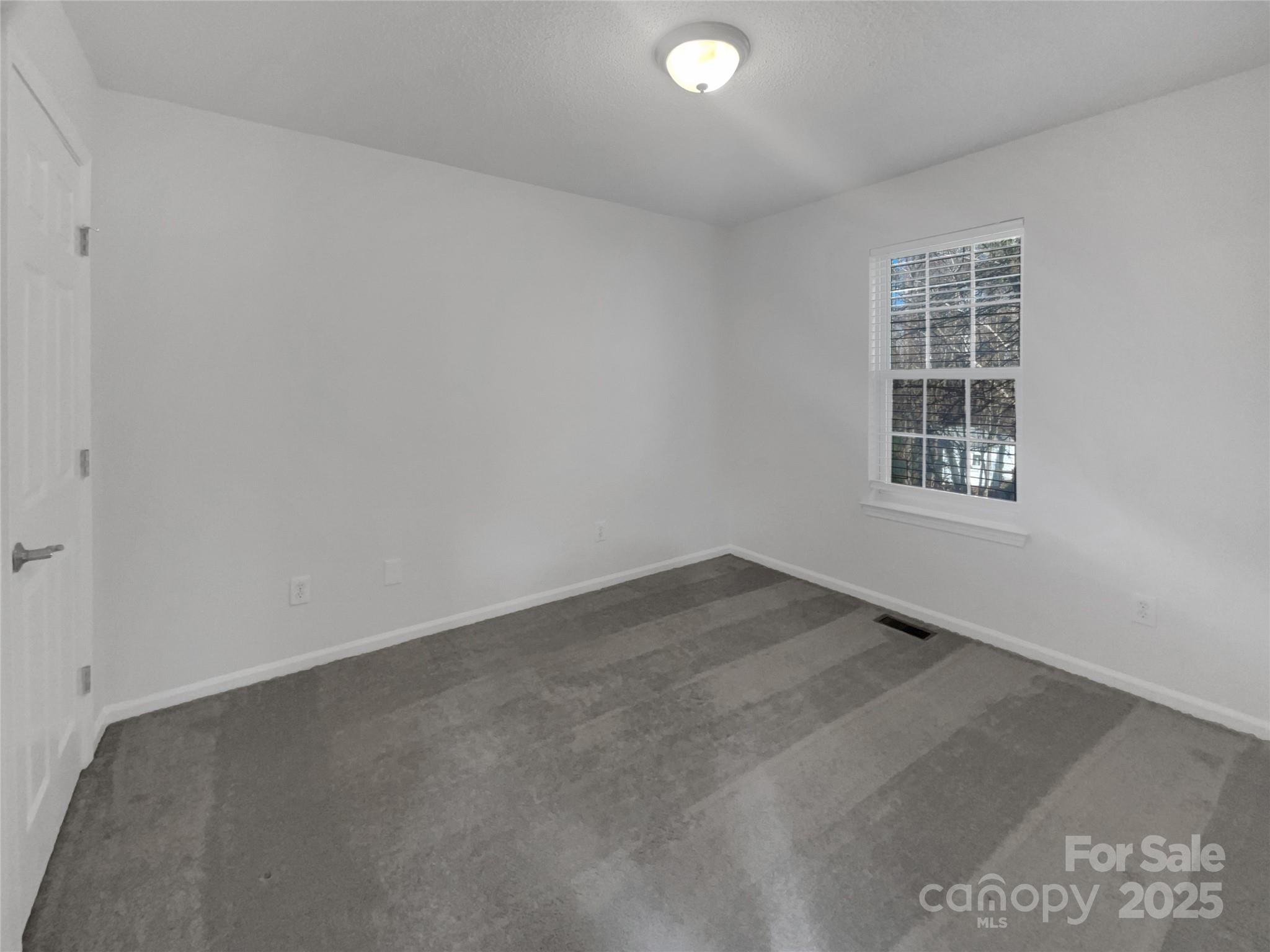 405 St George Road Fort Mill, SC 29708 - Photo 4 of 15 an empty room with a window