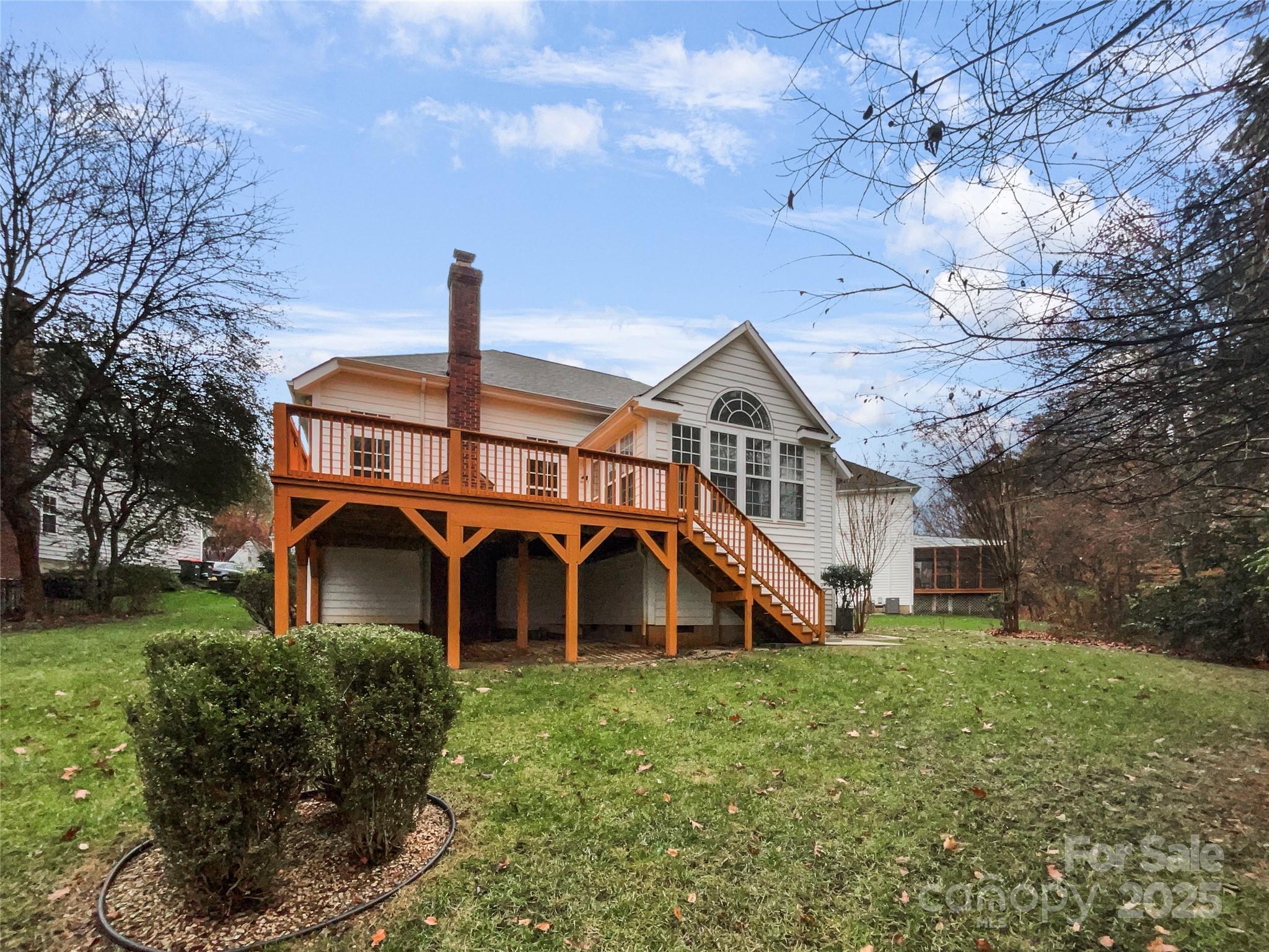 405 St George Road Fort Mill, SC 29708 - Photo 5 of 15 a front view of a house with garden