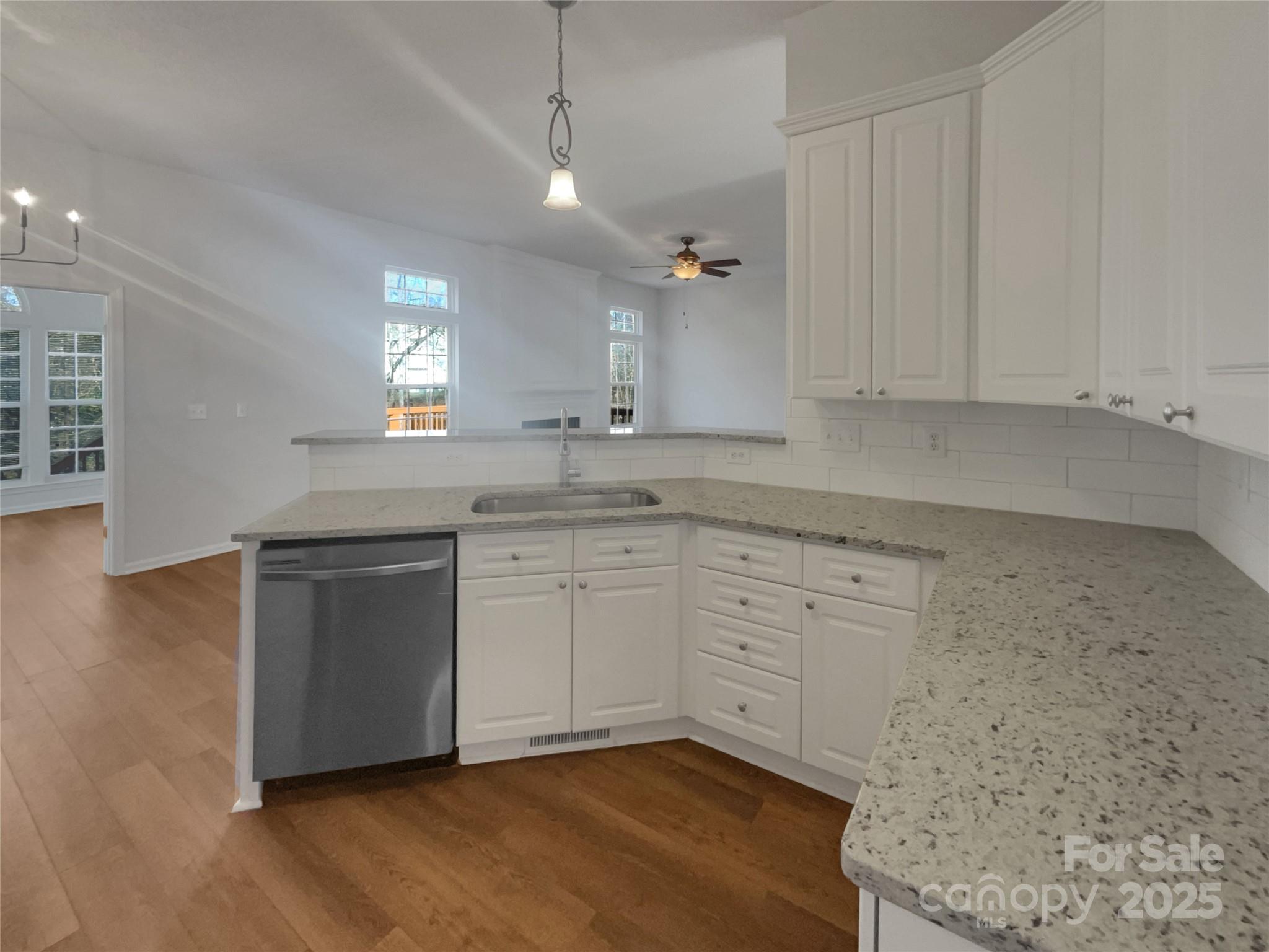 405 St George Road Fort Mill, SC 29708 - Photo 10 of 15 a kitchen with granite countertop white cabinets and white appliances