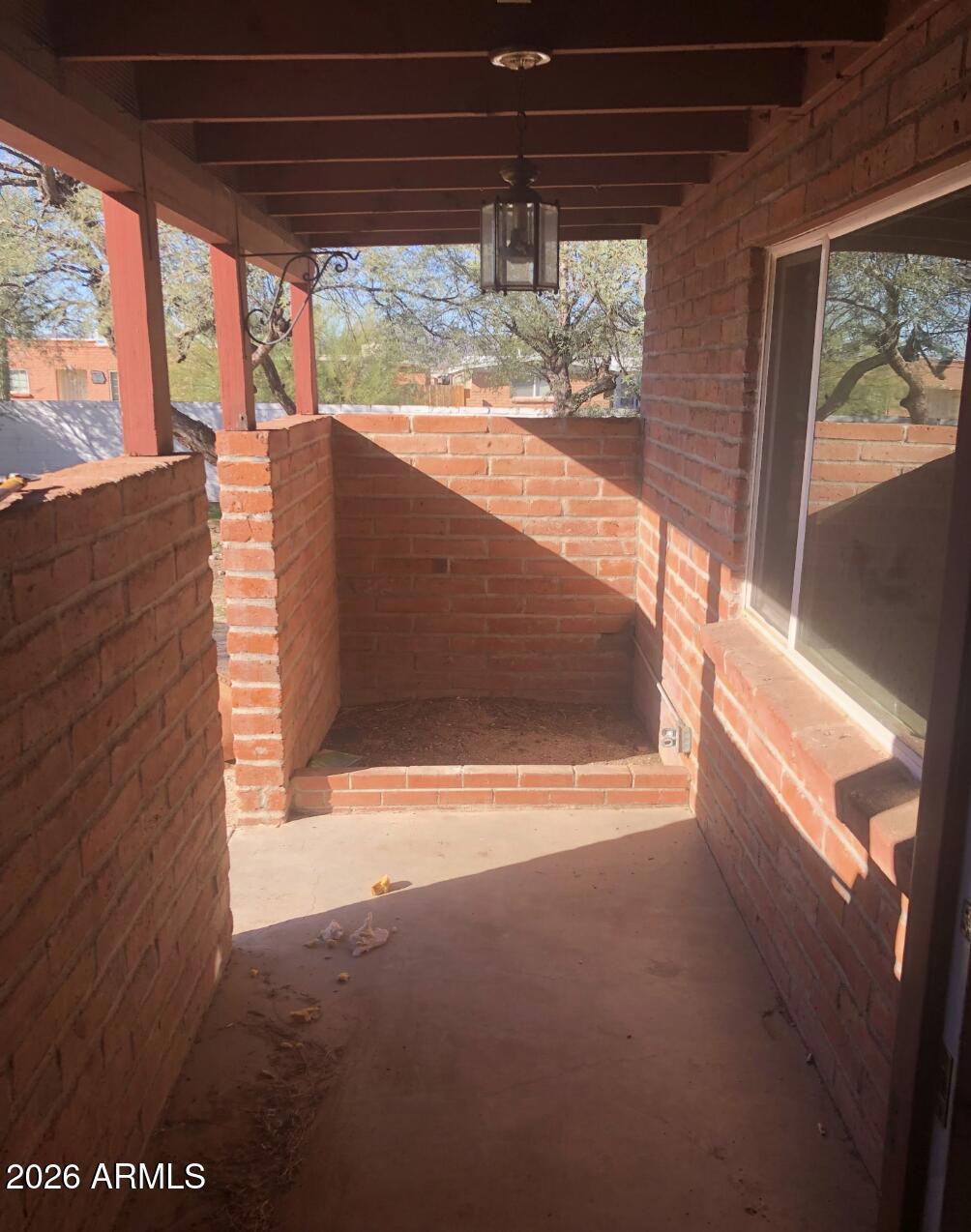 4260 West Mars Street Tucson, AZ 85741 - Photo 3 of 15 a view of a porch