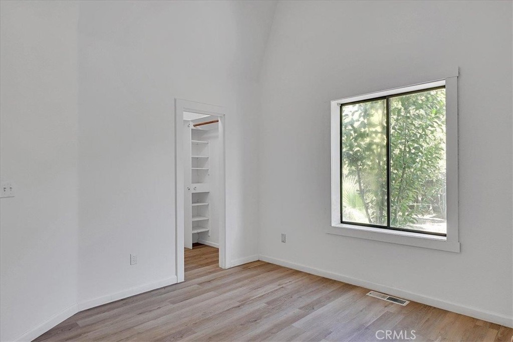 1732 Wescott Road Colusa, CA 95932 - Photo 48 of 56 an empty room with wooden floor and windows