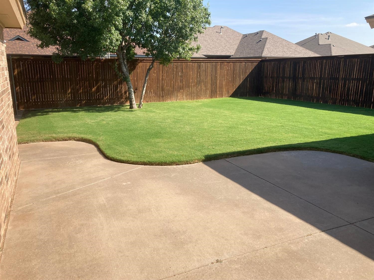 6120 75th Place Lubbock, TX 79424 - Photo 25 of 30 a view of a backyard with wooden fence