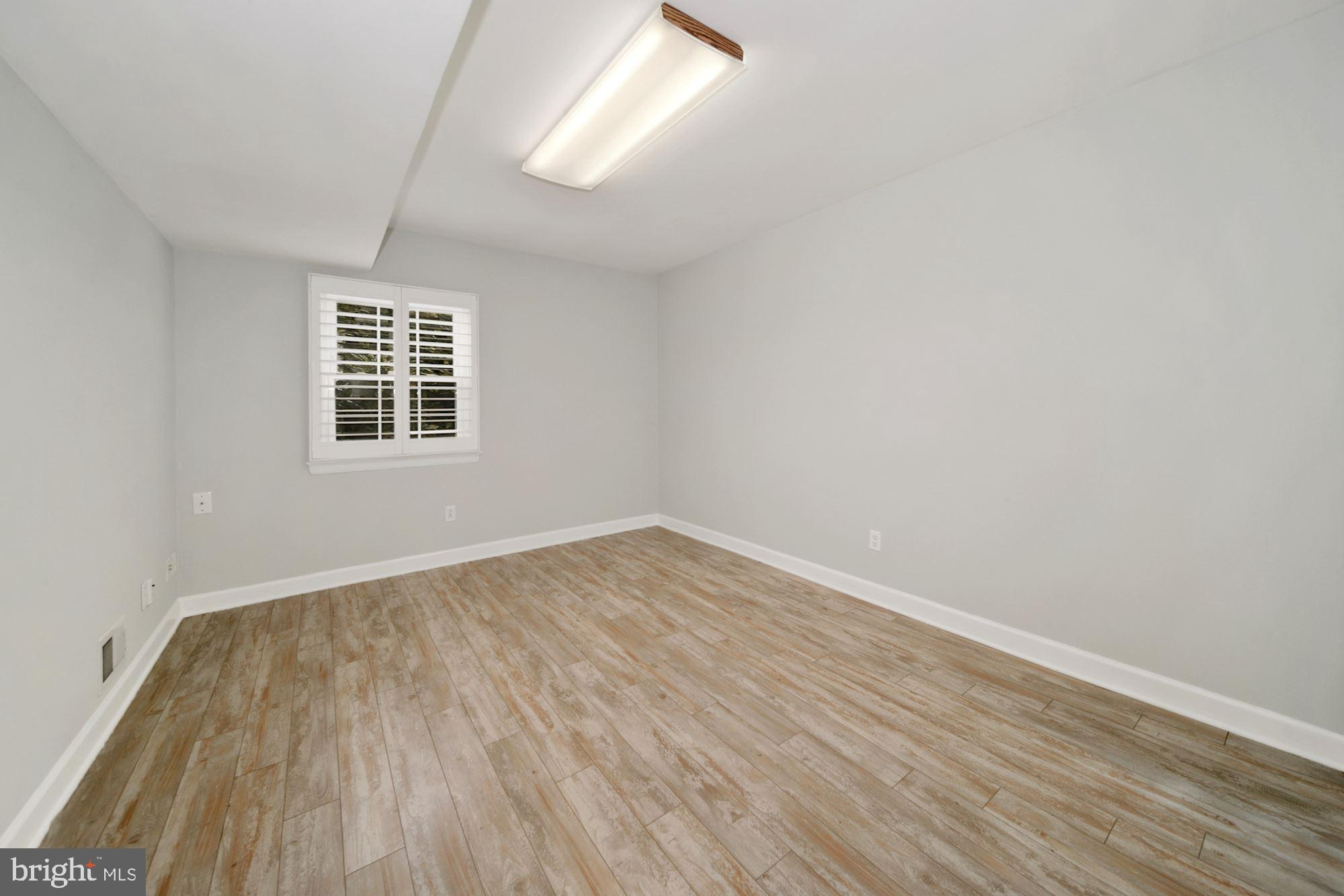 13124 Fernedge Road Silver Spring, MD 20906 - Photo 24 of 31 Lower level Bedroom.