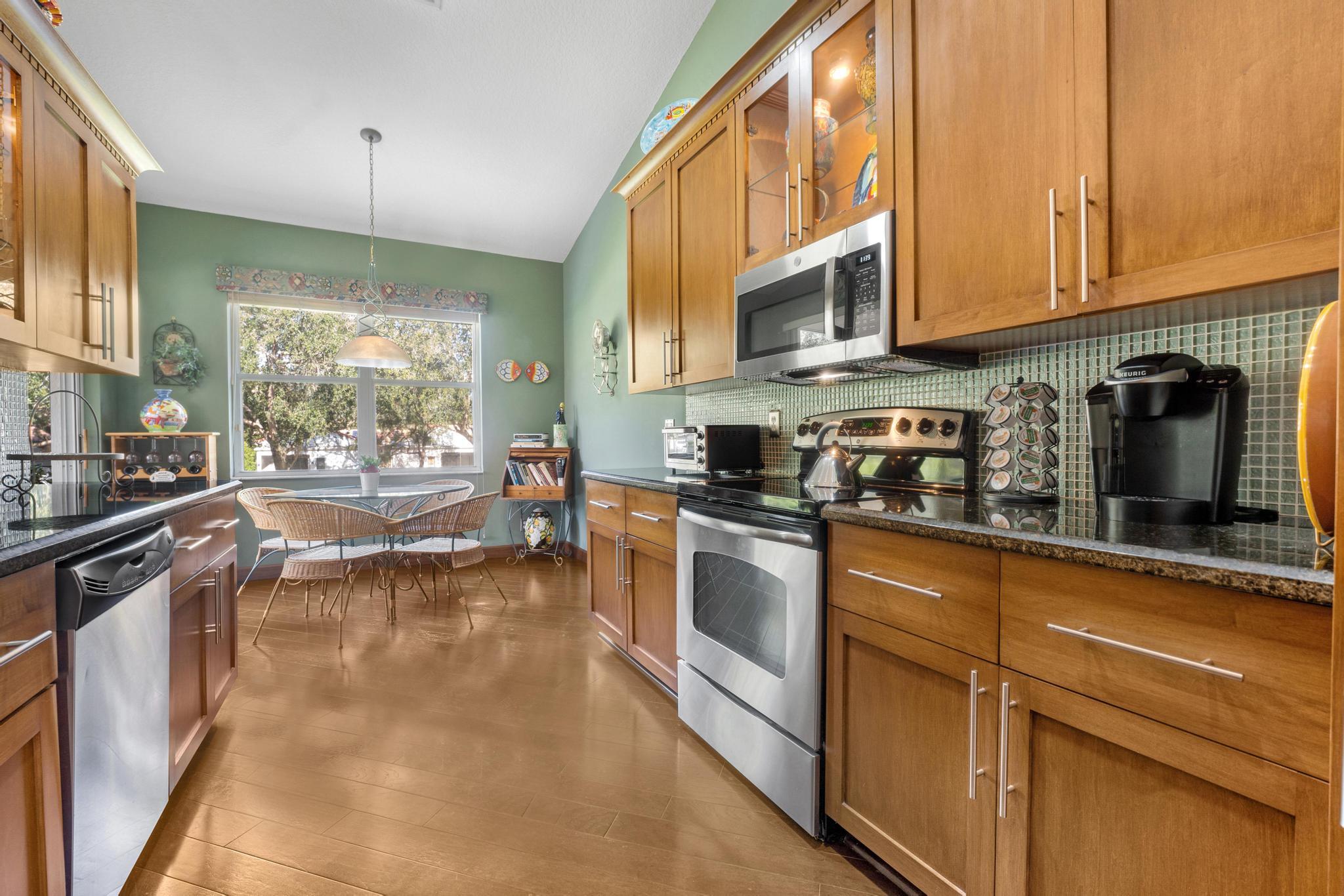 8653 Vía Reale, Unit 49U Boca Raton, FL 33496 - Photo 16 of 44 KITCHEN