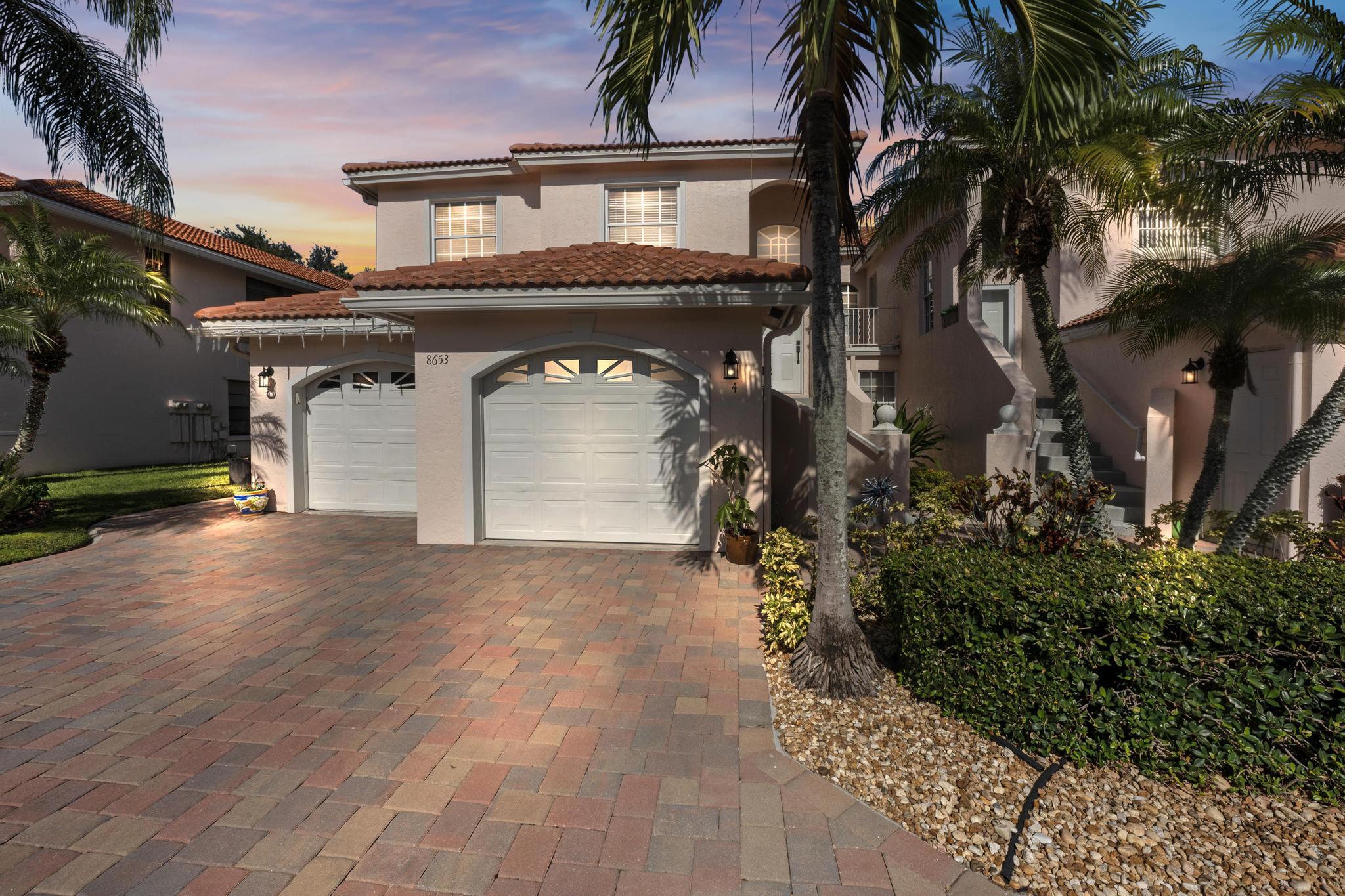 8653 Vía Reale, Unit 49U Boca Raton, FL 33496 - Photo 2 of 44 front of the house