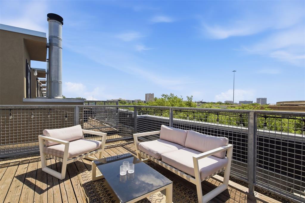 2111 Clark Street, Unit H Dallas, TX 75204 - Photo 24 of 37 a view of a roof deck with couches