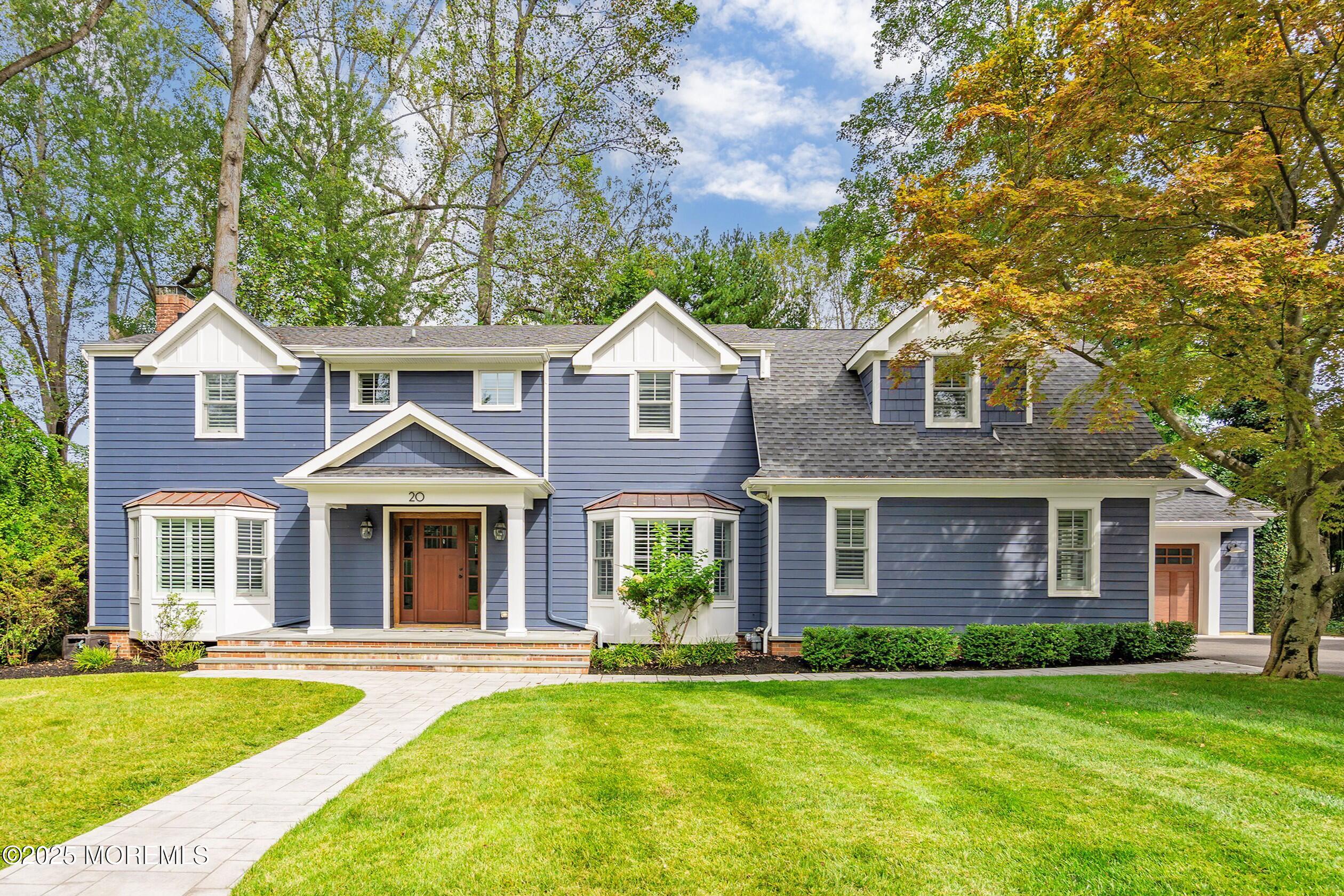 20 Rustic Terrace Fair Haven, NJ 07704 - Photo 1 of 32 front view of a brick house with a yard