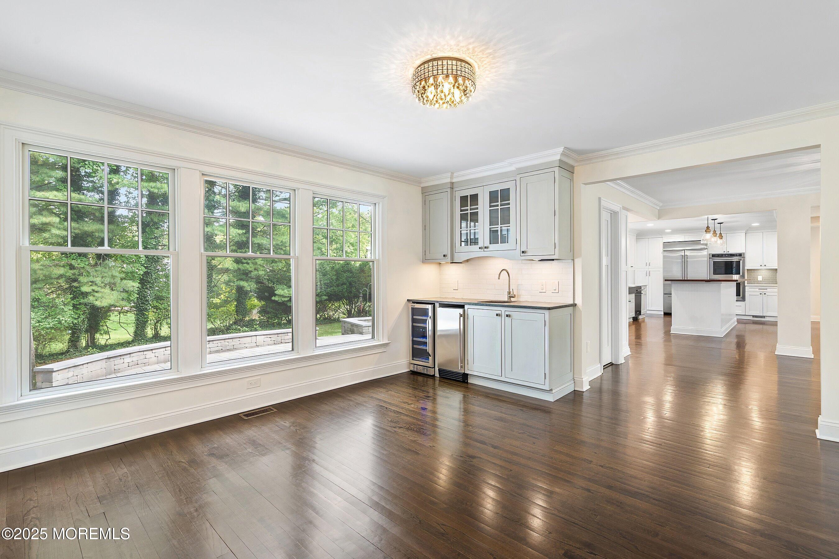 20 Rustic Terrace Fair Haven, NJ 07704 - Photo 13 of 32 a view of an empty room with wooden floor and a window