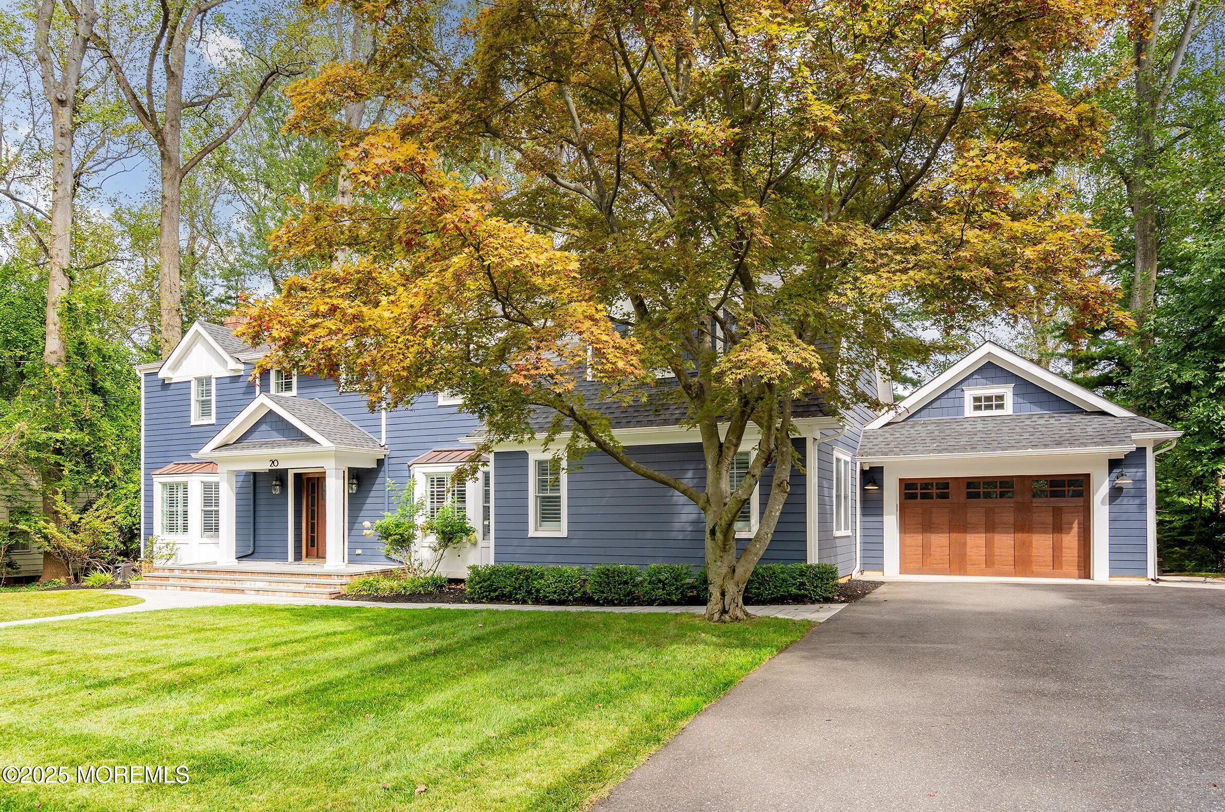 20 Rustic Terrace Fair Haven, NJ 07704 - Photo 2 of 32 front view of a house with a yard