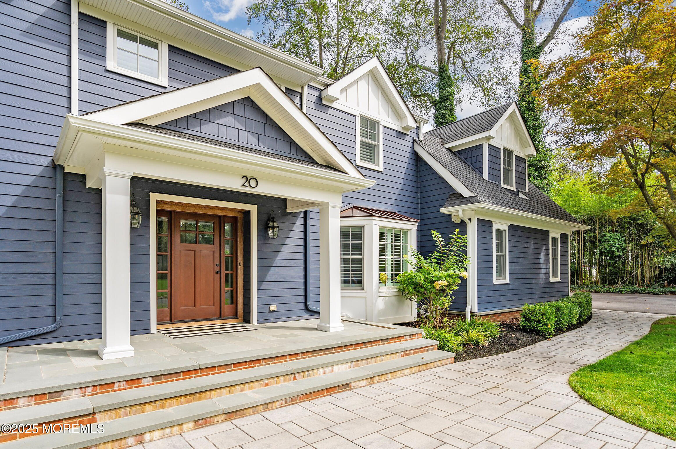20 Rustic Terrace Fair Haven, NJ 07704 - Photo 29 of 32 a view of a house with a small yard plants and large tree