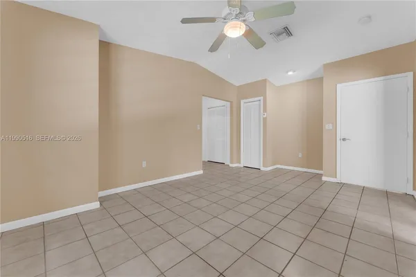 a view of an empty room and window